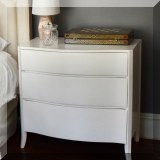 F28. White 3-drawer dresser. 34”h x 35”w x 20”d 